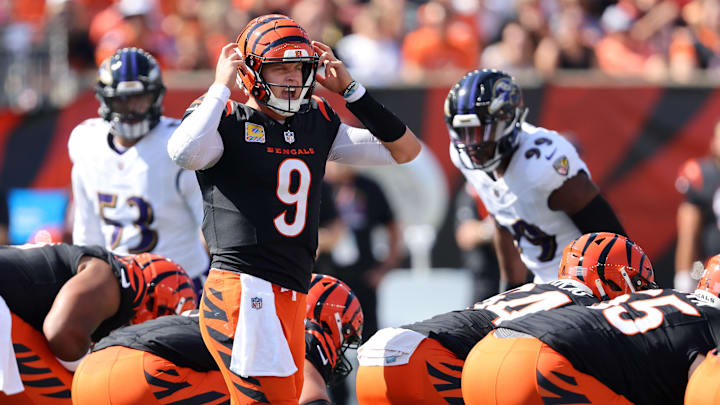 Oct 6, 2024; Cincinnati, Ohio, USA; Cincinnati Bengals quarterback Joe Burrow (9) calls an audible during the first quarter against the Baltimore Ravens at Paycor Stadium. Mandatory Credit: Joseph Maiorana-Imagn Images