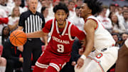 Indiana Hoosiers guard Kanaan Carlyle (9) dribbles the ball as Ohio State Buckeyes guard Ques Glover (6) defends during the first half at Value City Arena.