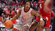 Dec 7, 2024; Columbus, Ohio, USA;  Ohio State Buckeyes guard Meechie Johnson Jr. (1) controls the ball as Rutgers Scarlet Knights guard Ace Bailey (4) defends during the second half at Value City Arena. Mandatory Credit: Joseph Maiorana-Imagn Images