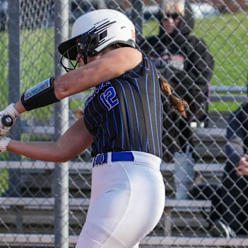 Germantown's Madison Werner (12) makes contact with the ball during a home game versus Divine Savior Holy Angels on Tuesday, April 22, 2025. 