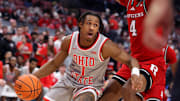 Dec 7, 2024; Columbus, Ohio, USA;  Ohio State Buckeyes guard Meechie Johnson Jr. (1) controls the ball as Rutgers Scarlet Knights guard Ace Bailey (4) defends during the second half at Value City Arena. Mandatory Credit: Joseph Maiorana-Imagn Images