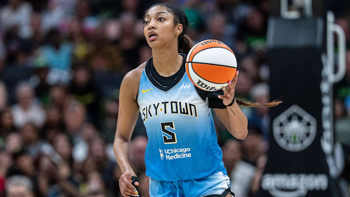 Aug 30, 2025; Seattle, Washington, USA; Chicago Sky forward Angel Reese (5) dribbles the ball against the Seattle Storm at Climate Pledge Arena. Mandatory Credit: Stephen Brashear-Imagn Images