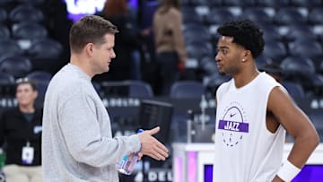 Dec 7, 2025; Salt Lake City, Utah, USA; Utah Jazz head coach Will Hardy (left) speaks with forward Brice Sensabaugh (right) before the game against the Oklahoma City Thunder at Delta Center. Mandatory Credit: Rob Gray-Imagn Images