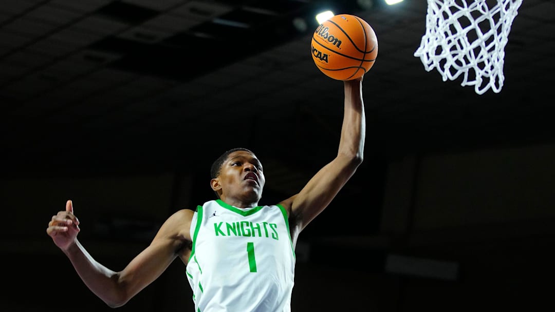 St. Mary’s forward Cameron Williams (1) dunks against Deer Valley during the 4A State Championship at Veterans Memorial Coliseum in Phoenix on March 6, 2025.