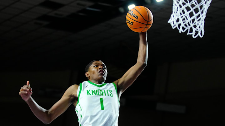 St. Mary’s forward Cameron Williams (1) dunks against Deer Valley during the 4A State Championship at Veterans Memorial Coliseum in Phoenix on March 6, 2025.