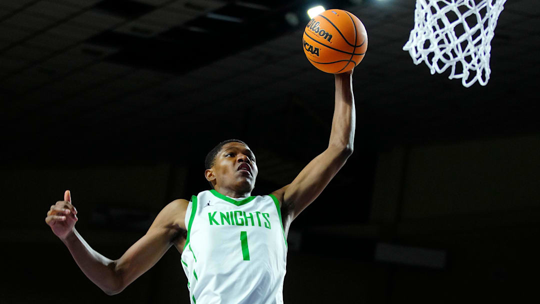 St. Mary’s forward Cameron Williams (1) dunks against Deer Valley during the 4A State Championship at Veterans Memorial Coliseum in Phoenix on March 6, 2025.