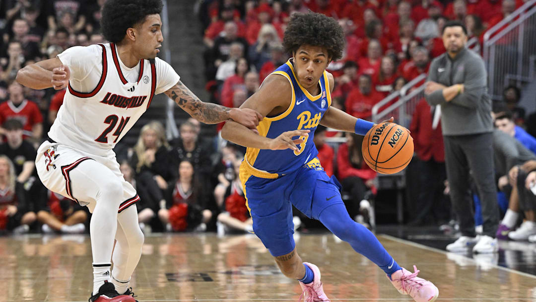Mar 1, 2025; Louisville, Kentucky, USA;  Pittsburgh Panthers guard Brandin Cummings (3) dribbles against Louisville Cardinals guard Chucky Hepburn (24) during the first half at KFC Yum! Center. Louisville defeated Pittsburgh 79-68. Mandatory Credit: Jamie Rhodes-Imagn Images