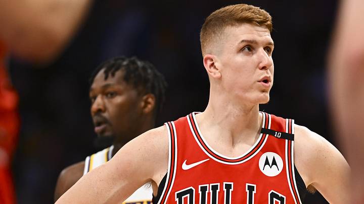 Mar 22, 2025; Los Angeles, California, USA; Chicago Bulls guard Kevin Huerter (13) reacts against Los Angeles Lakers forward Dorian Finney-Smith (17) during the first half at Crypto.com Arena. Mandatory Credit: Jonathan Hui-Imagn Images