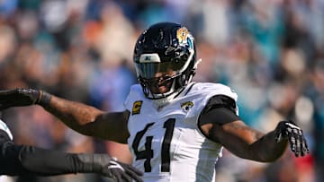 Nov 30, 2025; Nashville, Tennessee, USA; Jacksonville Jaguars defensive end Josh Hines-Allen (41) reacts after a sack against the Tennessee Titans during the first half at Nissan Stadium. Mandatory Credit: Steve Roberts-Imagn Images