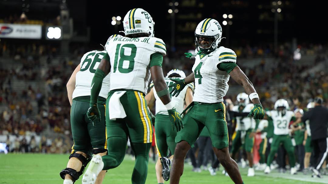 Oct 3, 2026; Tempe, Arizona, USA; Baylor Bears wide receiver Louis Brown IV (4) celebrates after Baylor Bears running back Caden Knighten (11) scores a touchdown against the Arizona State Sun Devils during the third quarter at Mountain America Stadium. Mandatory Credit: Anna Carrington-Imagn Images Oct 3, 2026; Tempe, Arizona, USA; Baylor Bears wide receiver Louis Brown IV (4) celebrates after Baylor Bears running back Caden Knighten (11) scores a touchdown against the Arizona State Sun Devils during the third quarter at Mountain America Stadium. Mandatory Credit: Anna Carrington-Imagn Images
