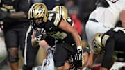 Purdue Boilermakers running back Devin Mockobee (45) jumps into the end zone