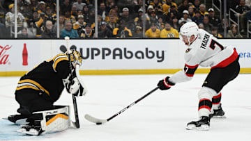 Nov 9, 2024; Boston, Massachusetts, USA; Ottawa Senators left wing Brady Tkachuk (7) attempts a shot on Boston Bruins goaltender Jeremy Swayman (1) during the second period at TD Garden. Mandatory Credit: Brian Fluharty-Imagn Images