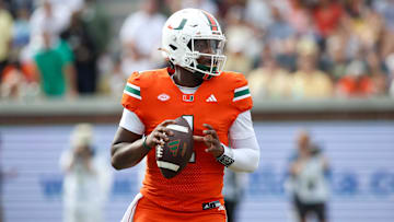 Nov 9, 2024; Atlanta, Georgia, USA; Miami Hurricanes quarterback Cam Ward (1) drops back to pass against the Georgia Tech Yellow Jackets in the third quarter at Bobby Dodd Stadium at Hyundai Field. Mandatory Credit: Brett Davis-Imagn Images