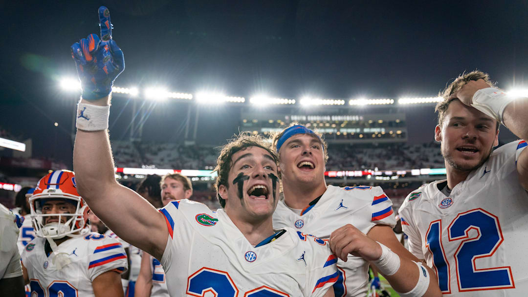 Florida Gators celebrate after scoring a win last season. These players are now eligible for direct payment from the UF Athletic Department this season.