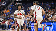 Mar 13, 2025; Nashville, TN, USA;  Mississippi Rebels guard Jaylen Murray (5) reacts after a made three point basket against the Arkansas Razorbacks during the first half at Bridgestone Arena. Mandatory Credit: Steve Roberts-Imagn Images