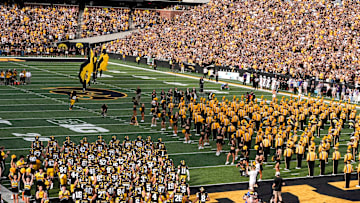 The Iowa Hawkeyes team takes the field against the Albany Great Danes during the Swarm Aug. 30, 2025 at Kinnick Stadium in Iowa City, Iowa.