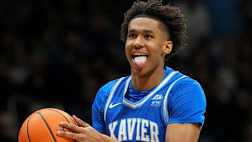 Xavier Musketeers forward Dailyn Swain (3) reacts after he gains control of the ball from the Butler Bulldogs during the first half of a game Wednesday, March 5, 2025, at Hinkle Fieldhouse in Indianapolis. Xavier defeated Butler 91-78.