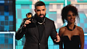 Rapper Drake shows up to accept best rap song at Grammys for "God's Plan" and the world-renowned artist has a love for NBA