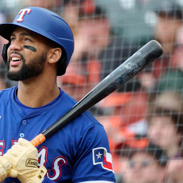 Apr 27, 2025; San Francisco, California, USA; Texas Rangers outfielder Leody Taveras (3) looks on in the on-deck circle against the San Francisco Giants during the seventh inning at Oracle Park. Mandatory Credit: Robert Edwards-Imagn Images