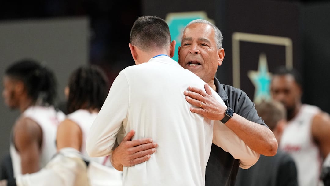 Houston Cougars head coach Kelvin Sampson greets Florida Gators head coach Todd Golden 