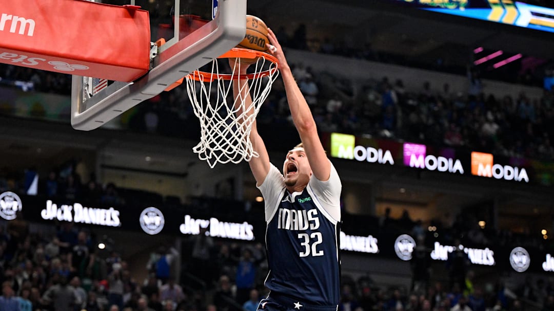 Jan 1, 2026; Dallas, Texas, USA; Dallas Mavericks forward Cooper Flagg (32) dunks the ball during the first quarter against the Philadelphia 76ers 