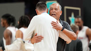 Houston Cougars head coach Kelvin Sampson greets Florida Gators head coach Todd Golden 