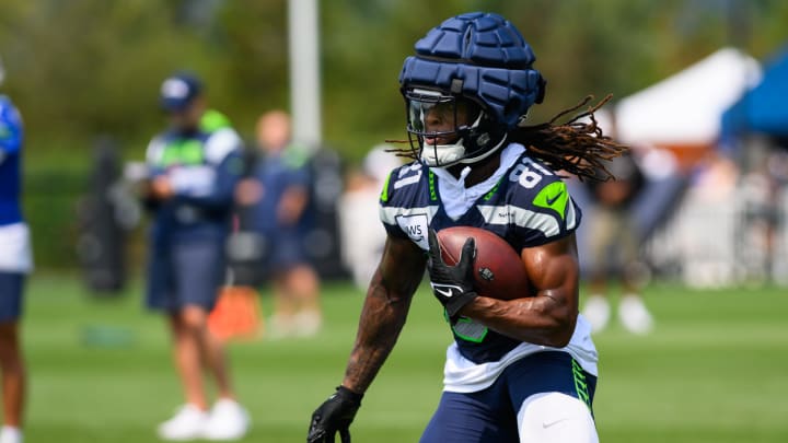 Jul 27, 2024; Renton, WA, USA; Seattle Seahawks wide receiver Laviska Shenault Jr. (81) carries the ball after making a catch during training camp at Virginia Mason Athletic Center. Mandatory Credit: Steven Bisig-USA TODAY Sports