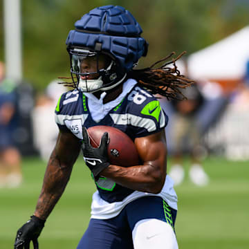 Jul 27, 2024; Renton, WA, USA; Seattle Seahawks wide receiver Laviska Shenault Jr. (81) carries the ball after making a catch during training camp at Virginia Mason Athletic Center. 