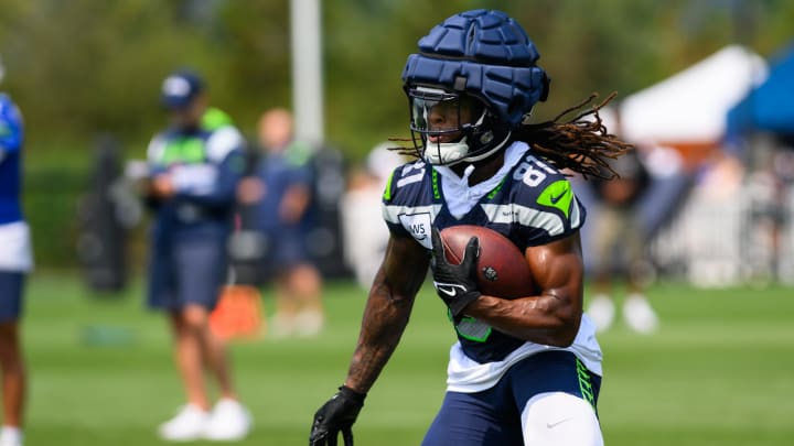 Jul 27, 2024; Renton, WA, USA; Seattle Seahawks wide receiver Laviska Shenault Jr. (81) carries the ball after making a catch during training camp at Virginia Mason Athletic Center. 