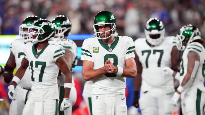 New York Jets quarterback Aaron Rodgers (8) walks out onto the field with the offense to face the Buffalo Bills in the home opener at MetLife Stadium on Monday, Sept. 11, 2023, in East Rutherford.