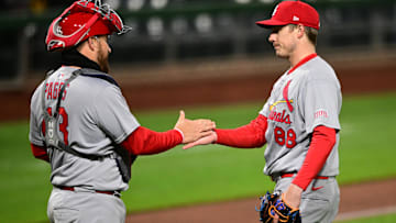 Apr 8, 2025; Pittsburgh, Pennsylvania, USA; St. Louis Cardinals relief pitcher Phil Maton (88) congratulates catcher Pedro Pages (43) after defeating the Pittsburgh Pirates at PNC Park. Mandatory Credit: David Dermer-Imagn Images