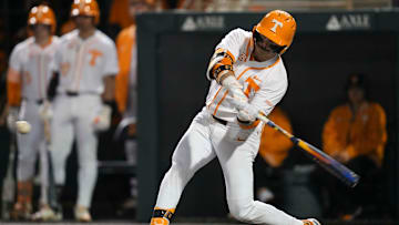Tennessee infielder Andrew Fischer (11) hits a home run during a NCAA baseball game between Tennessee and St. Bonaventure at Lindsey Nelson Stadium on Friday, March 6, 2025.
