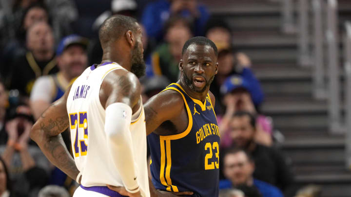 Jan 27, 2024; San Francisco, California, USA; Golden State Warriors forward Draymond Green (right) talks with Los Angeles Lakers forward LeBron James (left) during the third quarter at Chase Center. Mandatory Credit: Darren Yamashita-USA TODAY Sports