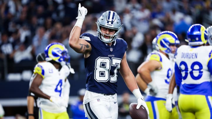 Oct 29, 2023; Arlington, Texas, USA;  Dallas Cowboys tight end Jake Ferguson (87) celebrates after catching a touchdown pass during the first quarter against the Los Angeles Rams at AT&T Stadium. Mandatory Credit: Kevin Jairaj-USA TODAY Sports