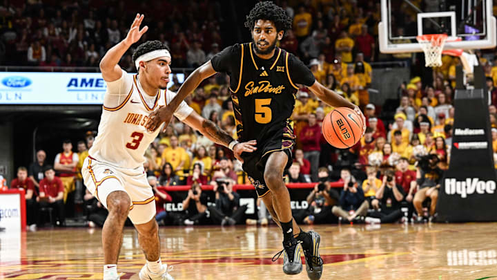Mar 7, 2026; Ames, Iowa, USA; Arizona State Sun Devils guard Maurice Odum (5) is defended by Iowa State Cyclones guard Tamin Lipsey (3) during the second half at James H. Hilton Coliseum. Mandatory Credit: Jeffrey Becker-Imagn Images