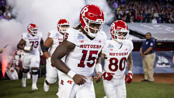 Dec 26, 2024; Phoenix, AZ, USA; Rutgers Scarlet Knights quarterback Ajani Sheppard (15) against the Kansas State Wildcats during the Rate Bowl at Chase Field. Mandatory Credit: Mark J. Rebilas-Imagn Images