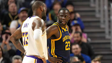 Jan 27, 2024; San Francisco, California, USA; Golden State Warriors forward Draymond Green (right) talks with Los Angeles Lakers forward LeBron James (left) during the third quarter at Chase Center. Mandatory Credit: Darren Yamashita-Imagn Images