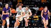 Iowa guard Emely Rodriguez (21) brings the ball down court against the Evansville Purple Aces Nov. 9, 2025 during a women’s basketball game at Carver-Hawkeye Arena in Iowa City, Iowa.