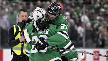 May 21, 2025; Dallas, Texas, USA; Dallas Stars goaltender Jake Oettinger (29) reacts with left wing Mason Marchment (27) after defeating the Edmonton Oilers in game one of the Western Conference Final of the 2025 Stanley Cup Playoffs at American Airlines Center. Mandatory Credit: Jerome Miron-Imagn Images