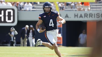 Sep 13, 2025; Charlottesville, Virginia, USA; Virginia Cavaliers quarterback Chandler Morris (4) runs with the ball during the first half against the William & Mary Tribe at Scott Stadium. Mandatory Credit: Amber Searls-Imagn Images