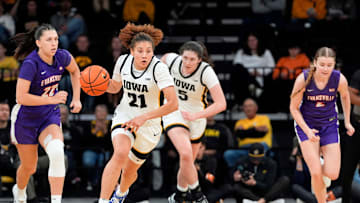 Iowa guard Emely Rodriguez (21) brings the ball down court against the Evansville Purple Aces Nov. 9, 2025 during a women’s basketball game at Carver-Hawkeye Arena in Iowa City, Iowa.