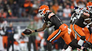 Nov 16, 2025; Cleveland, Ohio, USA; Cleveland Browns quarterback Shedeur Sanders (12) hands the ball off during the third quarter against the Baltimore Ravens at Huntington Bank Field. Mandatory Credit: Scott Galvin-Imagn Images