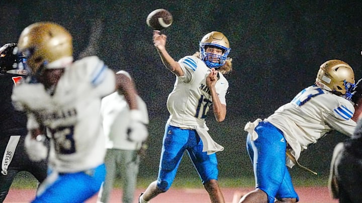 Mainland quarterback Sebastian Johnson passes the ball during a game against Cocoa last Friday.  The Buccaneers defeated the Tigers, 19-14, in a Central Florida Top 10 showdown