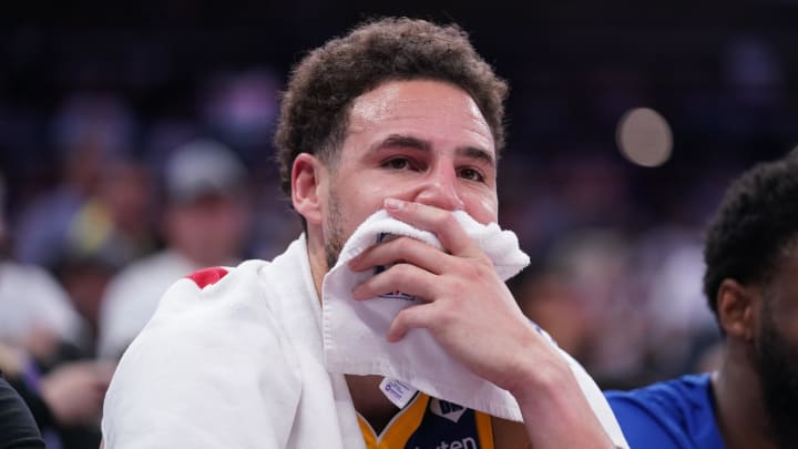 Apr 16, 2024; Sacramento, California, USA; Golden State Warriors guard Klay Thompson (11) sits on the bench during action against the Sacramento Kings in the fourth quarter during a play-in game of the 2024 NBA playoffs at the Golden 1 Center. Mandatory Credit: Cary Edmondson-USA TODAY Sports