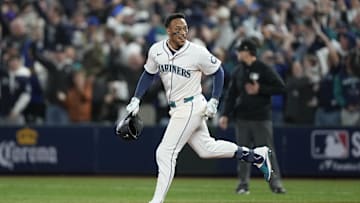 Oct 10, 2025; Seattle, Washington, USA; Seattle Mariners second baseman Jorge Polanco (7) hits a walk off single against the Detroit Tigers during the fifteenth inning during game five of the ALDS round for the 2025 MLB playoffs at T-Mobile Park.