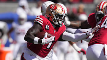 Oct 6, 2024; Santa Clara, California, USA; San Francisco 49ers wide receiver Deebo Samuel Sr. (1) carries the ball against the Arizona Cardinals during the first quarter at Levi's Stadium.