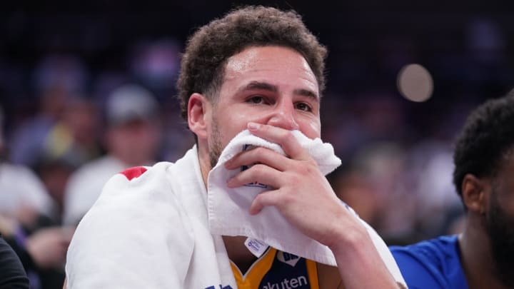 Apr 16, 2024; Sacramento, California, USA; Golden State Warriors guard Klay Thompson (11) sits on the bench during action against the Sacramento Kings in the fourth quarter during a play-in game of the 2024 NBA playoffs at the Golden 1 Center. Mandatory Credit: Cary Edmondson-USA TODAY Sports