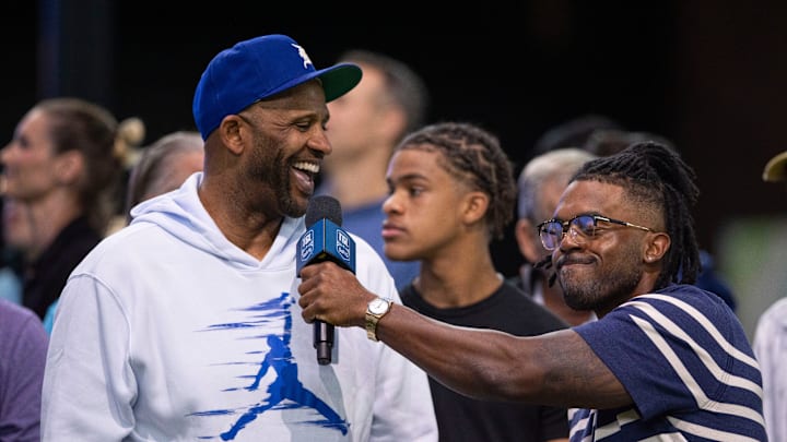 Former MLB pitcher CC Sabathia, left, attended the TGL match between Jupiter Links GC and New York Golf Club at SoFi Center on February 18, 2025, in Palm Beach Gardens, Florida.