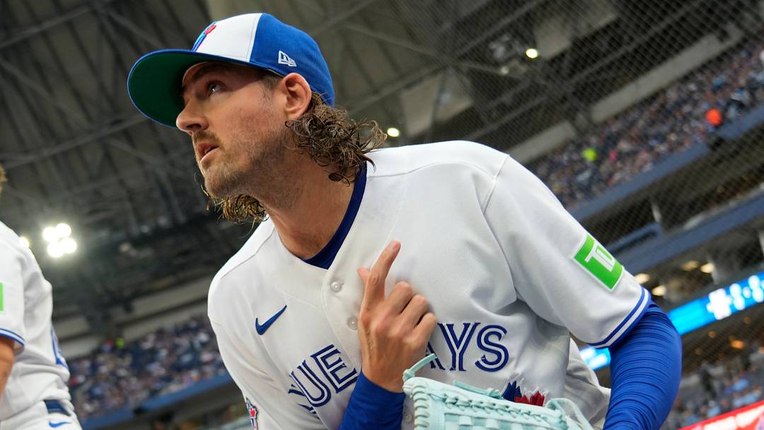 Toronto Blue Jays starting pitcher Kevin Gausman (34) takes to the field to start the game. Toronto Blue Jays starting pitcher Kevin Gausman (34) takes to the field to start the game.