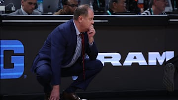 Mar 16, 2025; Indianapolis, IN, USA; Wisconsin Badgers head coach Greg Gard watches play downcourt during the second half against the Michigan Wolverines during the 2025 Big Ten Championship Game at Gainbridge Fieldhouse. Mandatory Credit: Trevor Ruszkowski-Imagn Images